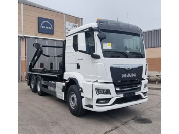 Skip loader truck