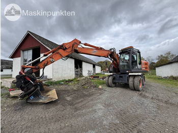 Wheel excavator HITACHI ZX140W-3