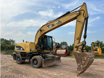 Wheel excavator CATERPILLAR M320