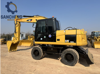 Wheel excavator CATERPILLAR M320