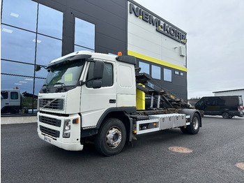 Skip loader truck VOLVO FM9