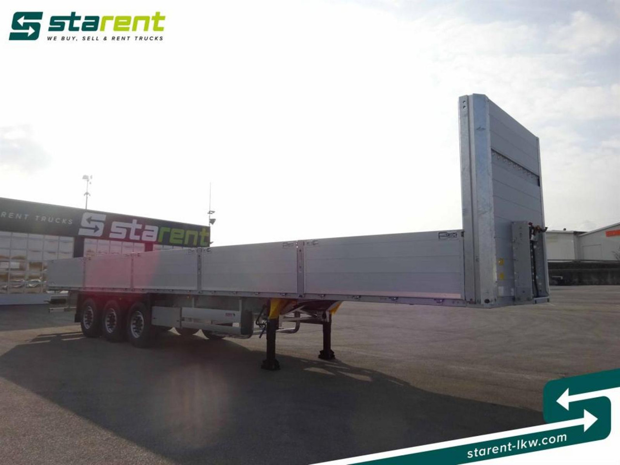 Schmitz Baustofftrailer Liftachse Rungen 80cm Bordwände - Dropside/ Flatbed semi-trailer: picture 3 Schmitz Baustofftrailer Liftachse Rungen 80cm Bordwände - Dropside/ Flatbed semi-trailer: picture 3