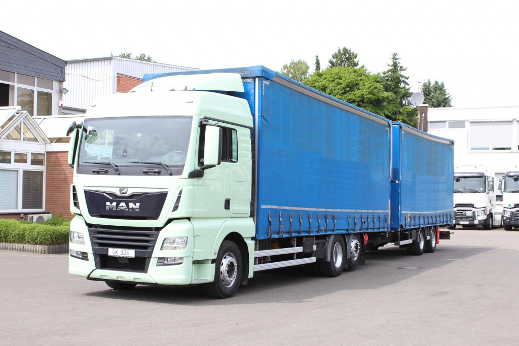 MAN TGX26.460 Durchlad Plane-Jumbo Retarder Hubdach - Curtainsider truck: picture 1 MAN TGX26.460 Durchlad Plane-Jumbo Retarder Hubdach - Curtainsider truck: picture 1
