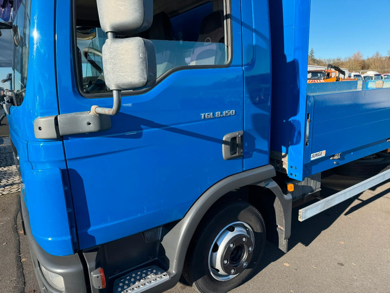MAN TGL 8.150 Pritsche AHK + Blattfederung MAN TGL 8.150 Pritsche AHK + Blattfederung - Flatbed van: picture 3 MAN TGL 8.150 Pritsche AHK + Blattfederung MAN TGL 8.150 Pritsche AHK + Blattfederung - Flatbed van: picture 3