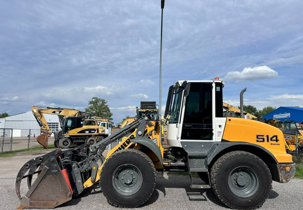 Liebherr L 514 Stereo +30 Kmh Klima 3er Kreis Greifschaufel - Wheel loader: picture 1 Liebherr L 514 Stereo +30 Kmh Klima 3er Kreis Greifschaufel - Wheel loader: picture 1