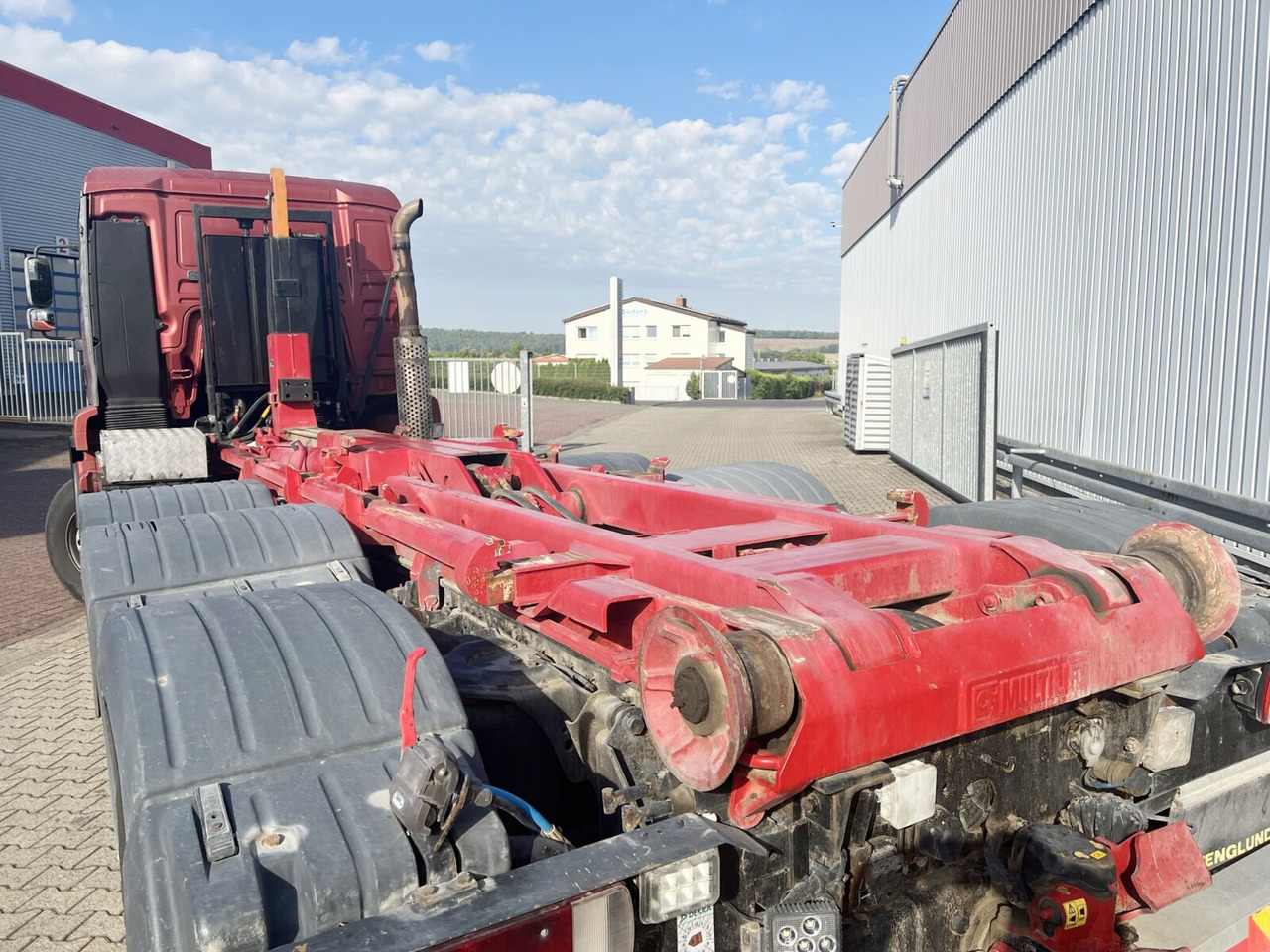 MAN TGA 25.530 8x4-4 BL, Lift-/Lenkachse TGA 25.530 8x4-4 BL, Lift-/Lenkachse - Hook lift truck: picture 3 MAN TGA 25.530 8x4-4 BL, Lift-/Lenkachse TGA 25.530 8x4-4 BL, Lift-/Lenkachse - Hook lift truck: picture 3