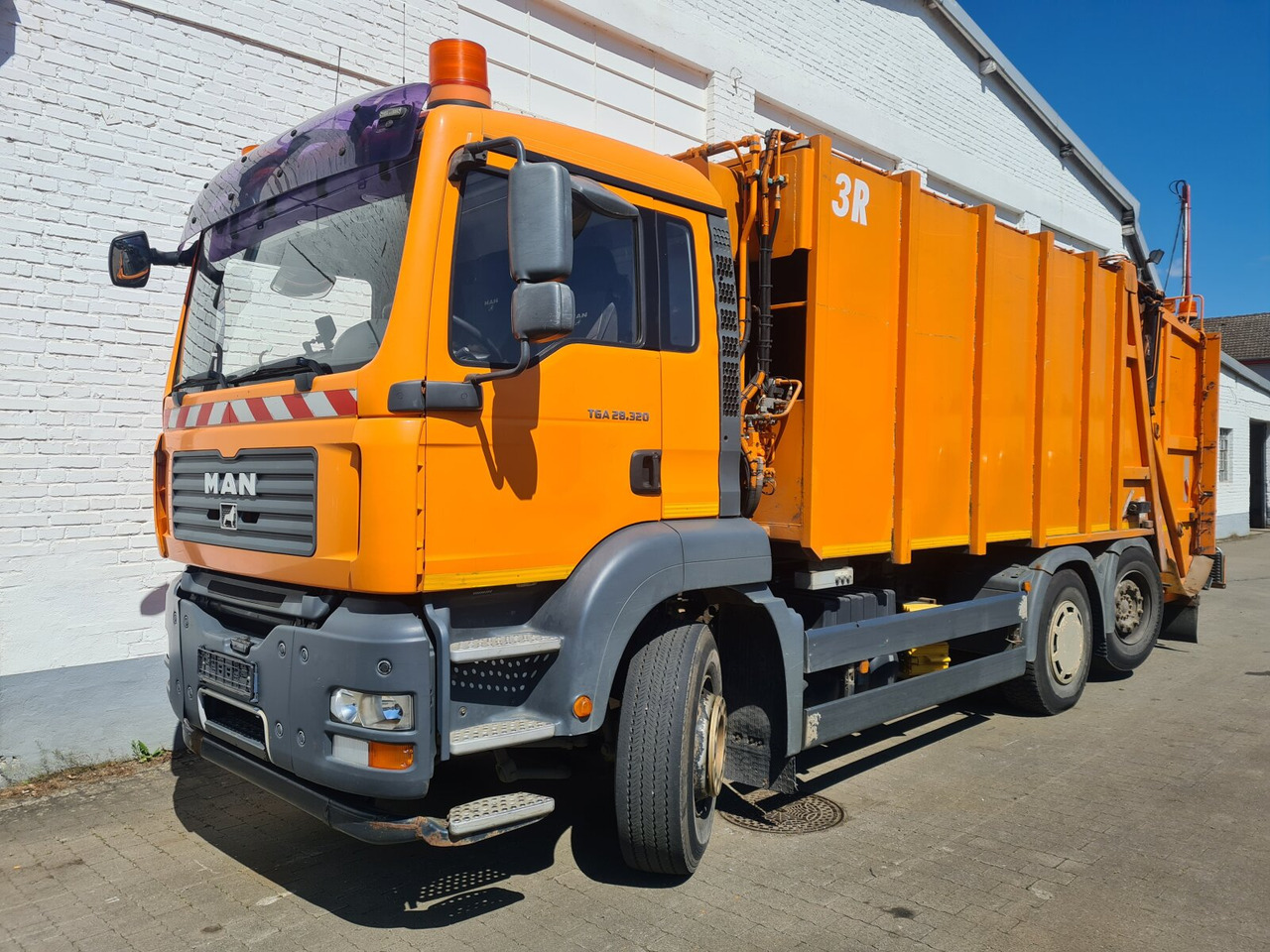 MAN TGA 28.320 6x2-4 BL TGA 28.320 6X2-4 BL, Lenkachse, Schörling 3R20SEW, Zöller-Schüttung - Garbage truck: picture 1 MAN TGA 28.320 6x2-4 BL TGA 28.320 6X2-4 BL, Lenkachse, Schörling 3R20SEW, Zöller-Schüttung - Garbage truck: picture 1