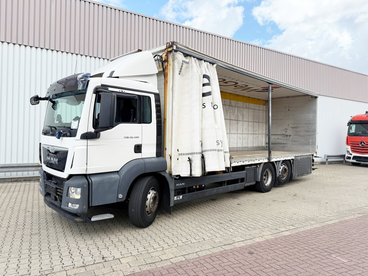 MAN TGS 26.400 6x2-4 LL TGS 26.400 6x2-4 LL, Lenk-/Lift, Hubdach - Dropside/ Flatbed truck, Crane truck: picture 1 MAN TGS 26.400 6x2-4 LL TGS 26.400 6x2-4 LL, Lenk-/Lift, Hubdach - Dropside/ Flatbed truck, Crane truck: picture 1