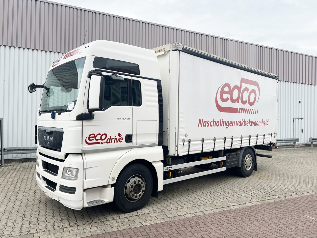 MAN TGX 18.400 4X2 BL TGX 18.400 4X2 BL, Fahrschule, 2x AHK, 6 Sitzer - Dropside/ Flatbed truck: picture 1 MAN TGX 18.400 4X2 BL TGX 18.400 4X2 BL, Fahrschule, 2x AHK, 6 Sitzer - Dropside/ Flatbed truck: picture 1