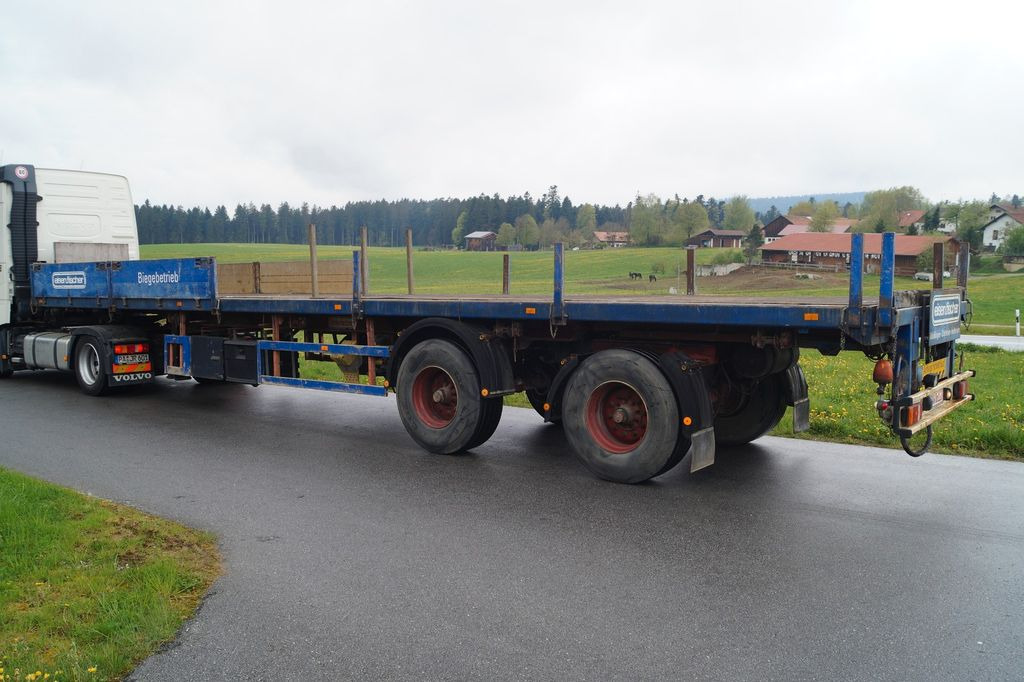 Unterholzner ULSZ 20/E Lenkachse Unterholzner ULSZ 20/E Lenkachse - Dropside/ Flatbed semi-trailer: picture 3 Unterholzner ULSZ 20/E Lenkachse Unterholzner ULSZ 20/E Lenkachse - Dropside/ Flatbed semi-trailer: picture 3