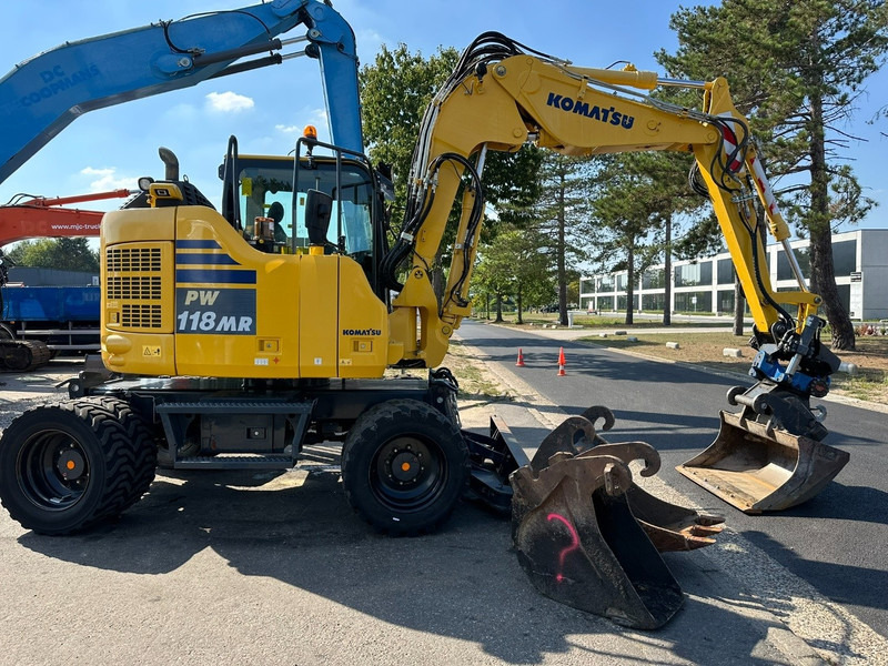 Komatsu PW 118 MR-11 14.3T - SMP ROTOTILT - *2413h* - CENTRAL GREASING - BLADE - 3 BUCKETS - TOP CONDITION - BE MACHINE - Wheel excavator: picture 5 Komatsu PW 118 MR-11 14.3T - SMP ROTOTILT - *2413h* - CENTRAL GREASING - BLADE - 3 BUCKETS - TOP CONDITION - BE MACHINE - Wheel excavator: picture 5