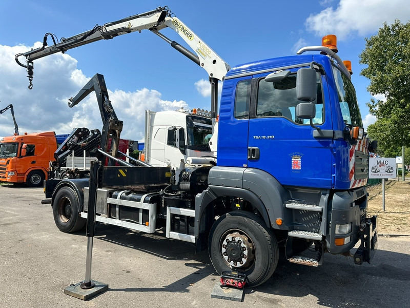 MAN TGA 18.310 4x4 HOOKLIFT + CRANE PALFINGER PK12000 - RADIO - ROTATOR - STEEL SPRING / HUB REDUCTION - MANUAL ZF - BE TRUCK - Hook lift truck, Crane truck: picture 1 MAN TGA 18.310 4x4 HOOKLIFT + CRANE PALFINGER PK12000 - RADIO - ROTATOR - STEEL SPRING / HUB REDUCTION - MANUAL ZF - BE TRUCK - Hook lift truck, Crane truck: picture 1
