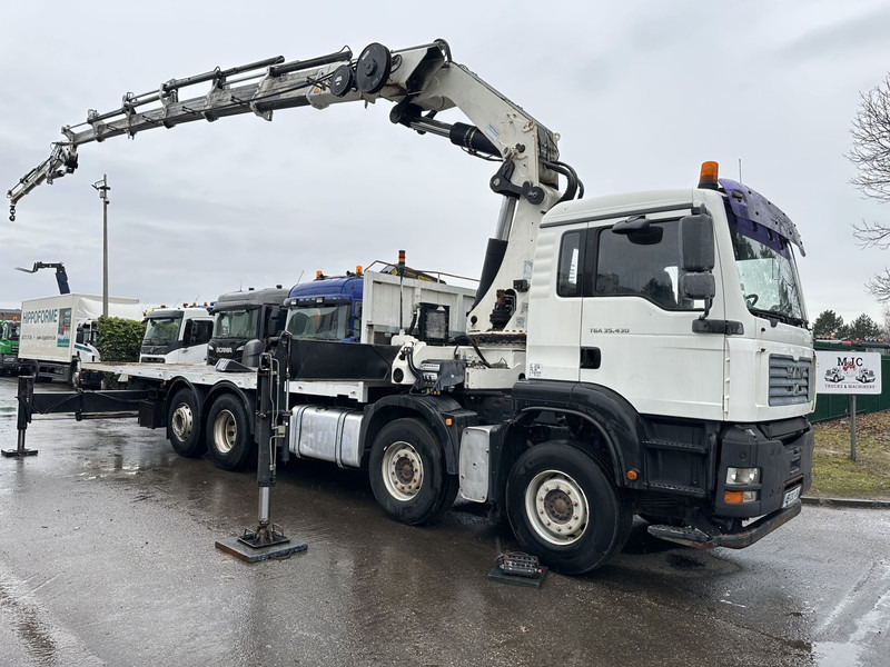 MAN TGA 35.430 8x2 + CRANE HIAB 700 E-6 + JIB 165X-3 - RETARDER - PLATFORM 6m70~8m50 EXTENDABLE - MANUAL GEARBOX ZF - LIFT + STEERING AXLE - Crane truck: picture 1 MAN TGA 35.430 8x2 + CRANE HIAB 700 E-6 + JIB 165X-3 - RETARDER - PLATFORM 6m70~8m50 EXTENDABLE - MANUAL GEARBOX ZF - LIFT + STEERING AXLE - Crane truck: picture 1