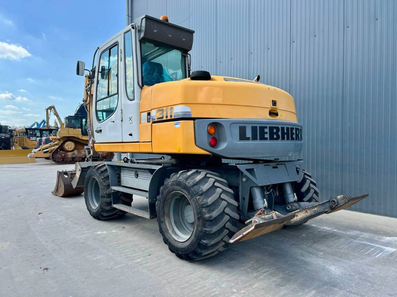 Liebherr A311 Litronic - Wheel excavator: picture 2 Liebherr A311 Litronic - Wheel excavator: picture 2