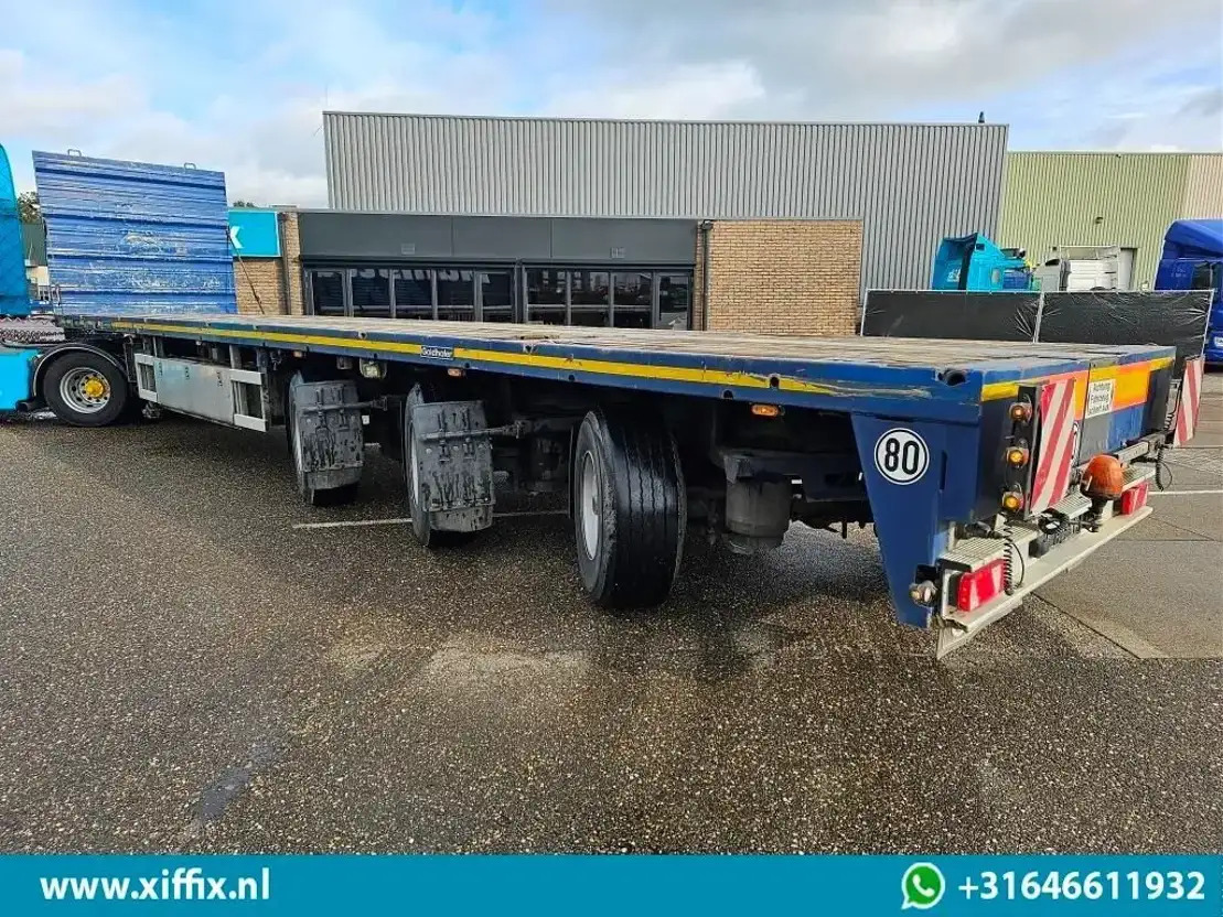 Goldhofer 3-ass. Vlakke uitschuifbare oplegger / 3x gestuurd - Dropside/ Flatbed semi-trailer: picture 3 Goldhofer 3-ass. Vlakke uitschuifbare oplegger / 3x gestuurd - Dropside/ Flatbed semi-trailer: picture 3