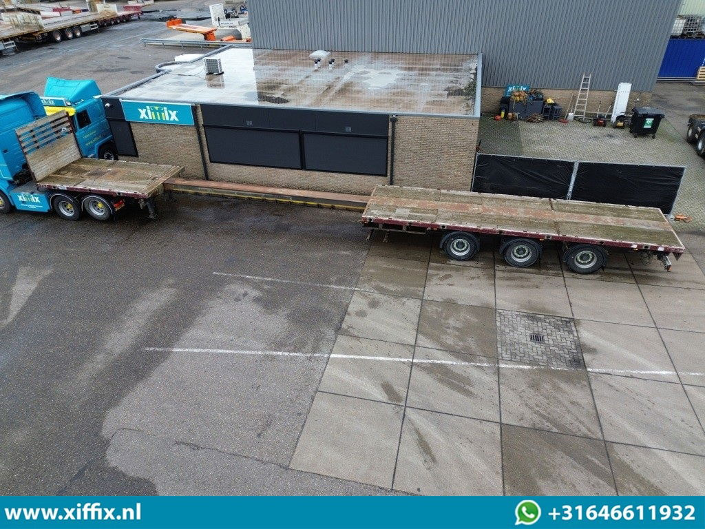 Meusburger 3-ass. Vlakke uitschuifbare oplegger / 3x gestuurd - Dropside/ Flatbed semi-trailer: picture 2 Meusburger 3-ass. Vlakke uitschuifbare oplegger / 3x gestuurd - Dropside/ Flatbed semi-trailer: picture 2