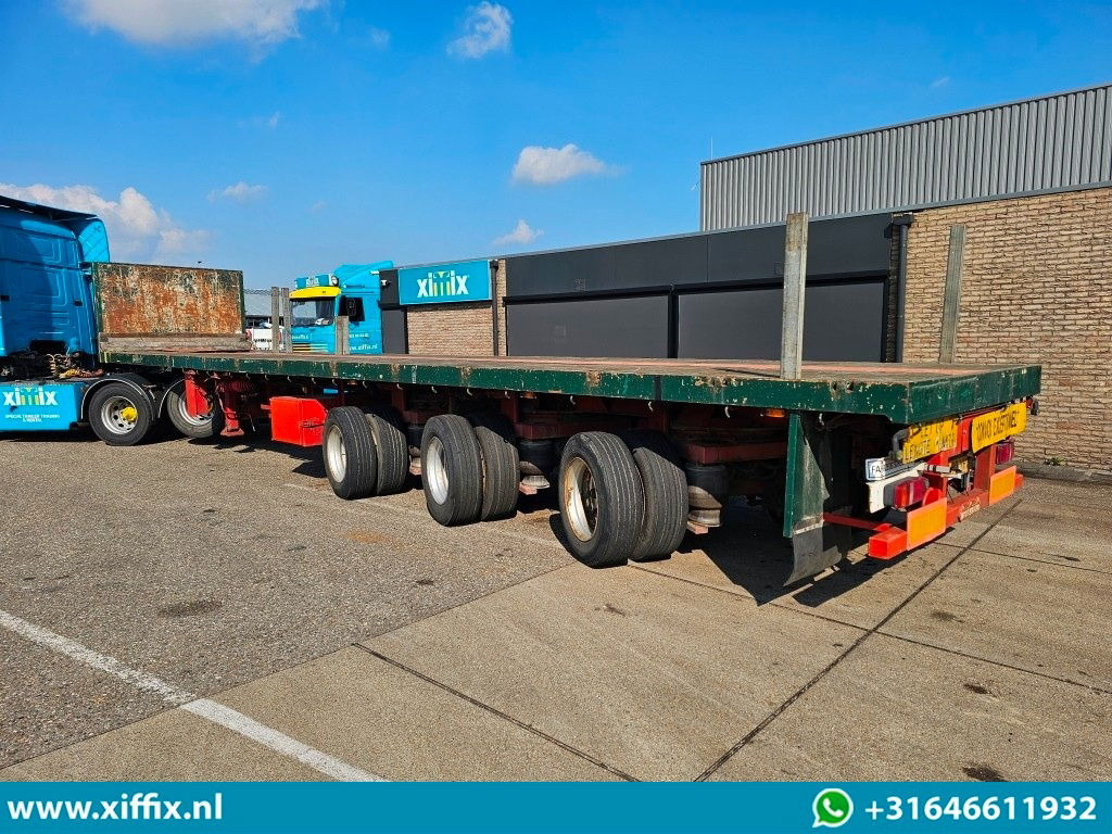 Nooteboom 3-ass. Vlakke dubbel 2x uitschuifbare oplegger / 3x gestuurd - Dropside/ Flatbed semi-trailer: picture 4 Nooteboom 3-ass. Vlakke dubbel 2x uitschuifbare oplegger / 3x gestuurd - Dropside/ Flatbed semi-trailer: picture 4