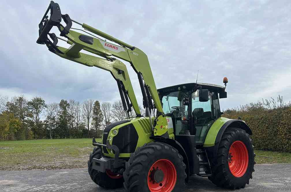 Claas Arion 640 cis, lucht, frontlader - Farm tractor: picture 1 Claas Arion 640 cis, lucht, frontlader - Farm tractor: picture 1