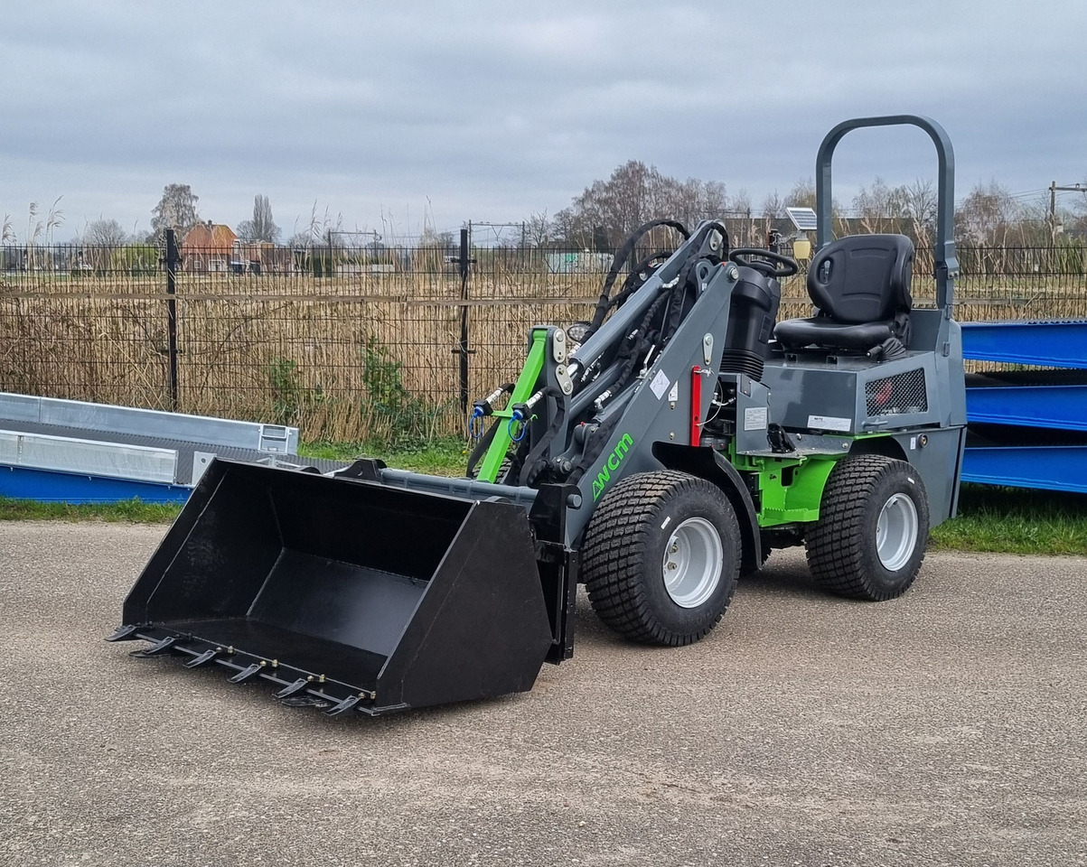 Brede gras banden - Wheel loader: picture 1 Brede gras banden - Wheel loader: picture 1