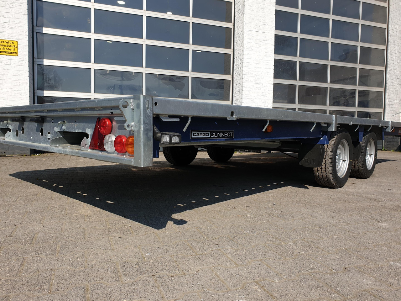 Dropside/ Flatbed trailer Brian James Trailer CarGO Connect 550x225cm Plateau Tandem 12" 3500kg Abverkauf 22: picture 6 Dropside/ Flatbed trailer Brian James Trailer CarGO Connect 550x225cm Plateau Tandem 12" 3500kg Abverkauf 22: picture 6