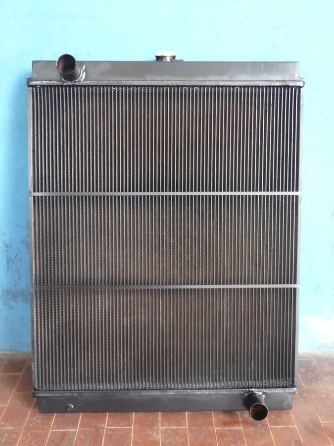 • RADIATORE NEW HOLLAND E195/215/245/ 87339771-72210130 - Radiator: picture 1 • RADIATORE NEW HOLLAND E195/215/245/ 87339771-72210130 - Radiator: picture 1