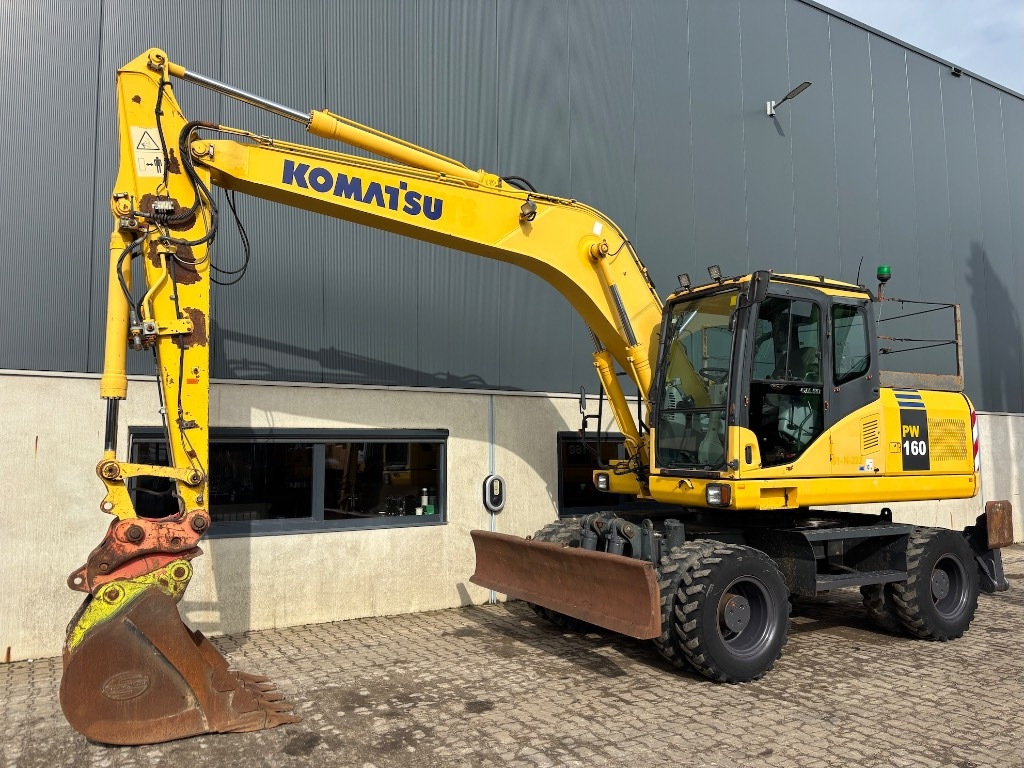 Komatsu PW 160-7 - PW160 - PW 160 - PW 180 - PW 140 - Wheel excavator: picture 1 Komatsu PW 160-7 - PW160 - PW 160 - PW 180 - PW 140 - Wheel excavator: picture 1