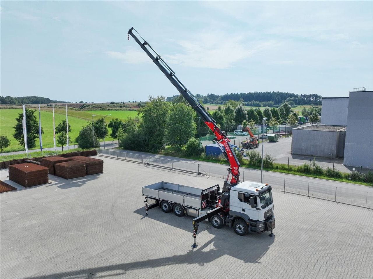 MAN 35.470 8x2 Kran F710 RA2.26 - Dropside/ Flatbed truck, Crane truck: picture 1 MAN 35.470 8x2 Kran F710 RA2.26 - Dropside/ Flatbed truck, Crane truck: picture 1