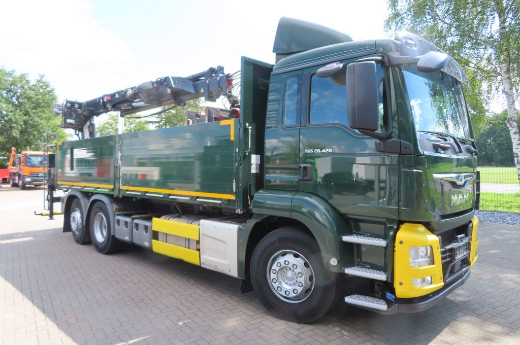 MAN TGX 26.500 6x2 - Baustoff - Kran HIAB - Crane truck, Dropside/ Flatbed truck: picture 1 MAN TGX 26.500 6x2 - Baustoff - Kran HIAB - Crane truck, Dropside/ Flatbed truck: picture 1