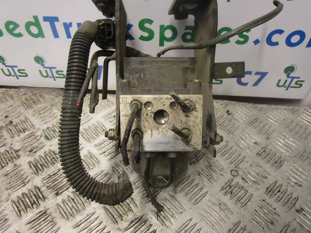 MITSUBISHI FUSO / CANTER ABS PUMP P/NO MK355141 - Brake parts for Truck: picture 1 MITSUBISHI FUSO / CANTER ABS PUMP P/NO MK355141 - Brake parts for Truck: picture 1