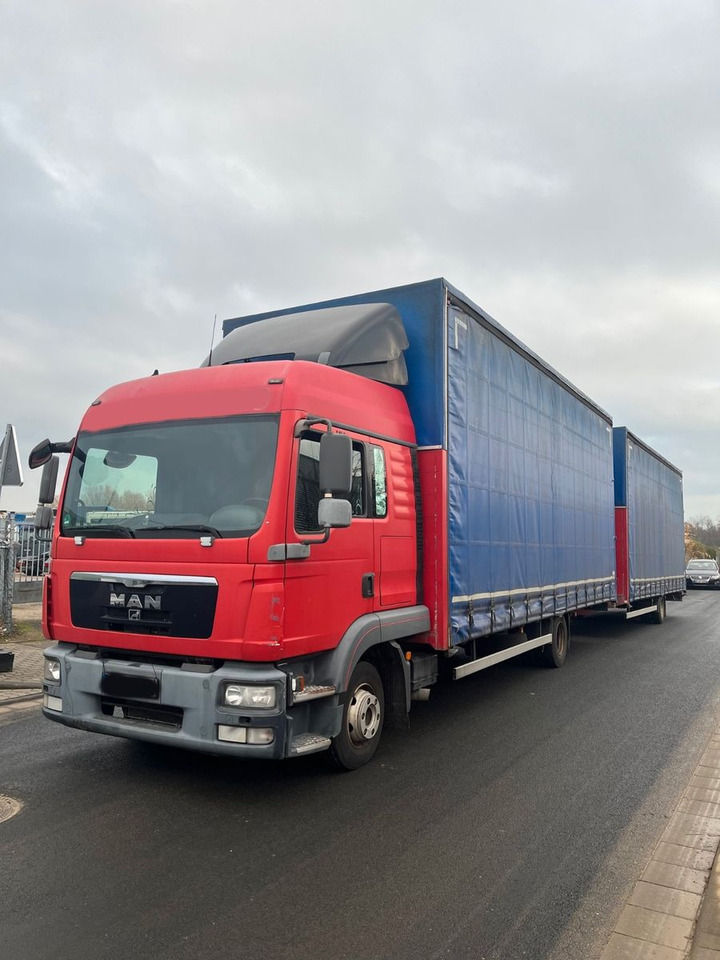 MAN 8.220 4X2 Pritschenwagen - Curtainsider truck: picture 1 MAN 8.220 4X2 Pritschenwagen - Curtainsider truck: picture 1