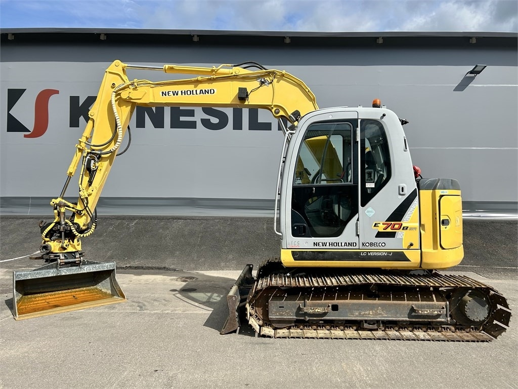 New Holland E 70BSR 2D MITTALAITTEET - Mini excavator: picture 1 New Holland E 70BSR 2D MITTALAITTEET - Mini excavator: picture 1