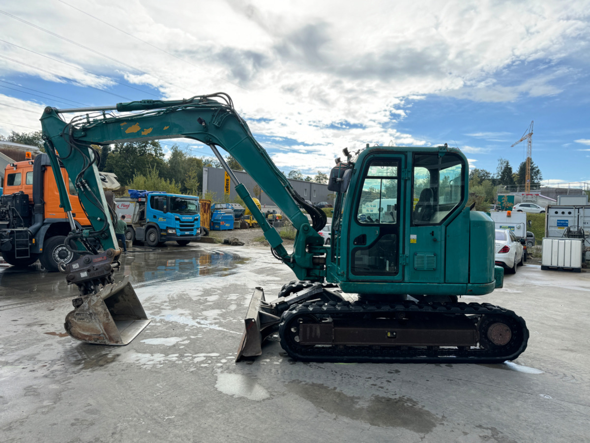 CATERPILLAR 308E2CR Oilquick 3x Schaufeln - Crawler excavator: picture 1 CATERPILLAR 308E2CR Oilquick 3x Schaufeln - Crawler excavator: picture 1