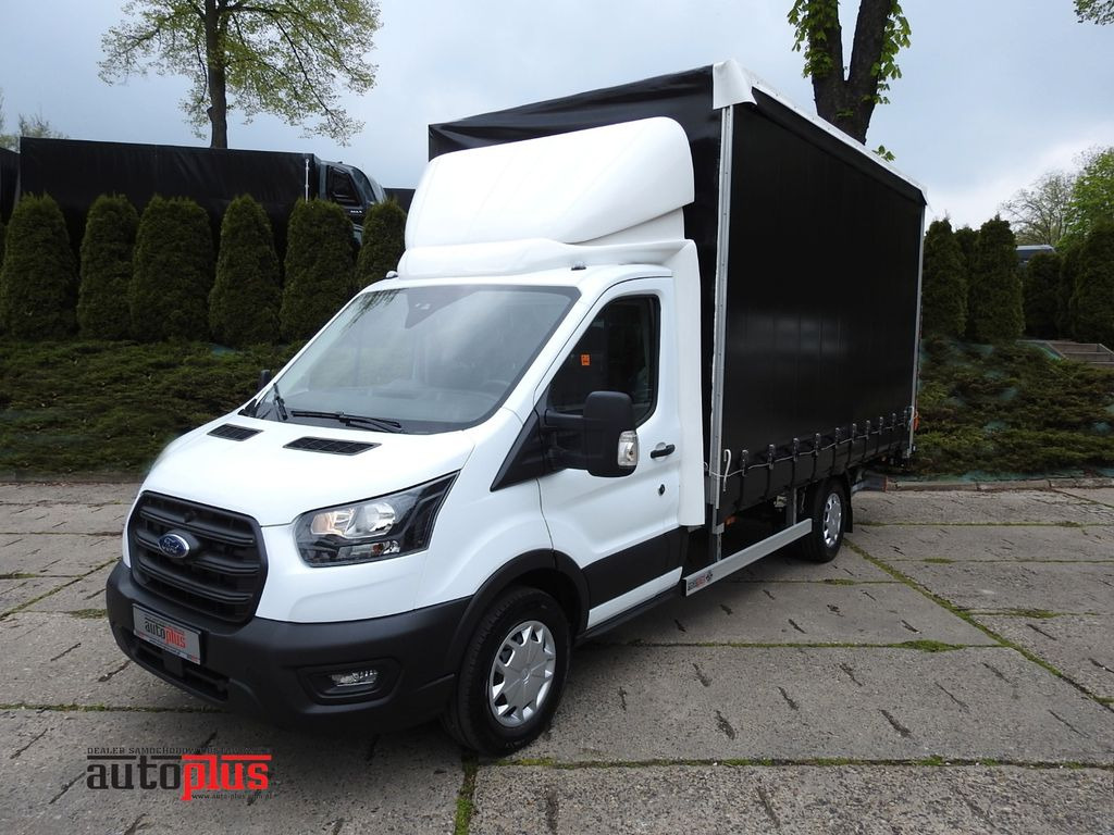 Ford TRANSIT PRITSCHE PLANE 8 PALLETS AUFZUG A/C - Curtain side van: picture 1 Ford TRANSIT PRITSCHE PLANE 8 PALLETS AUFZUG A/C - Curtain side van: picture 1