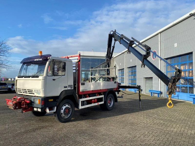 Steyr LÄRMARM 12S23 / 4X4 / CRANE HIAB 092 / WINCH / ONLY: 117406KM / TOP CONDITION / BIG AXLE / FULL STEEL+DRUM BRAKES / MANUAL / EUR - Crane truck: picture 1 Steyr LÄRMARM 12S23 / 4X4 / CRANE HIAB 092 / WINCH / ONLY: 117406KM / TOP CONDITION / BIG AXLE / FULL STEEL+DRUM BRAKES / MANUAL / EUR - Crane truck: picture 1