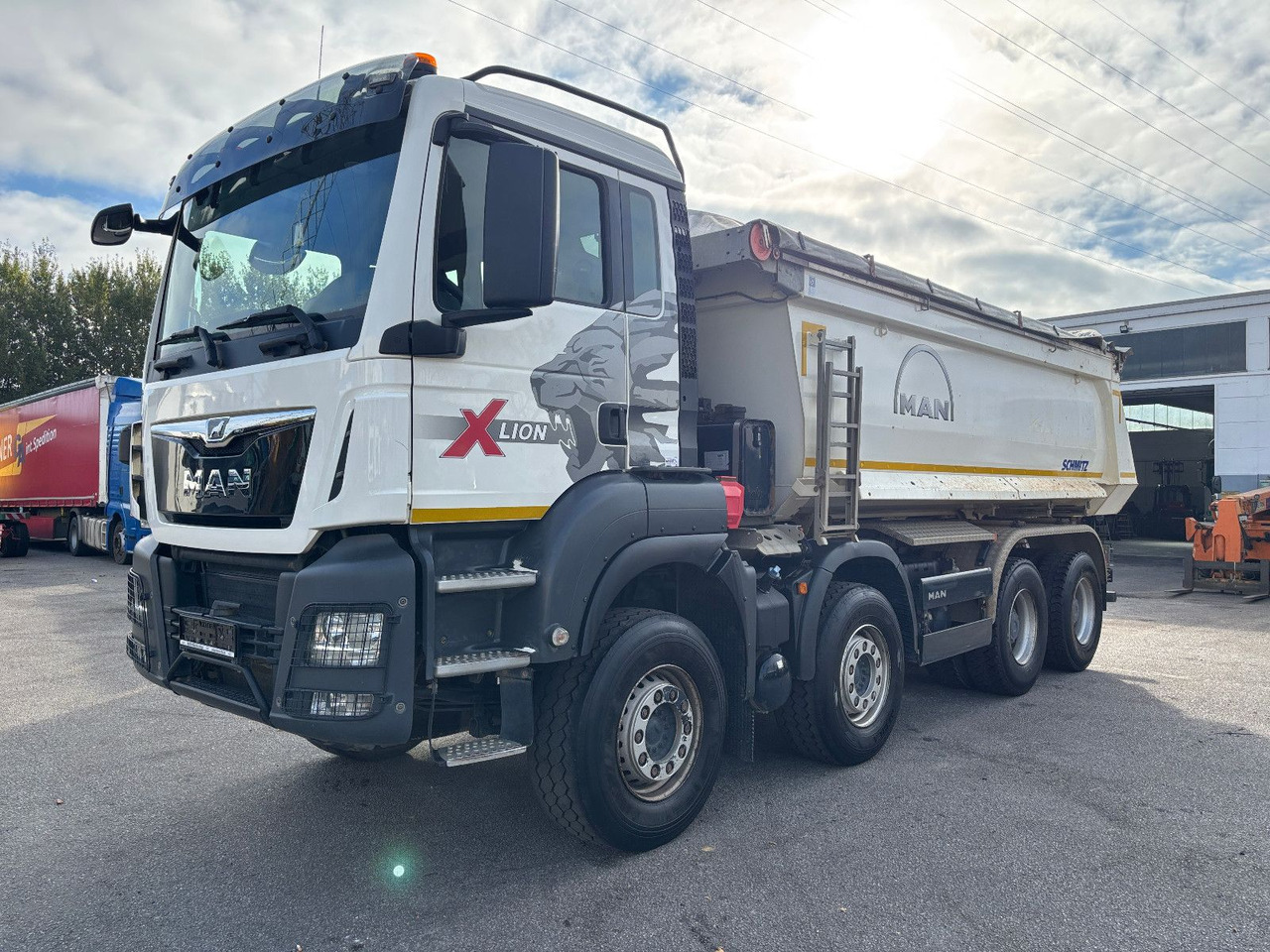 MAN TGS41.510 8x4 Schmitz Muldenkipper Retarder/19m³ - Tipper: picture 1 MAN TGS41.510 8x4 Schmitz Muldenkipper Retarder/19m³ - Tipper: picture 1