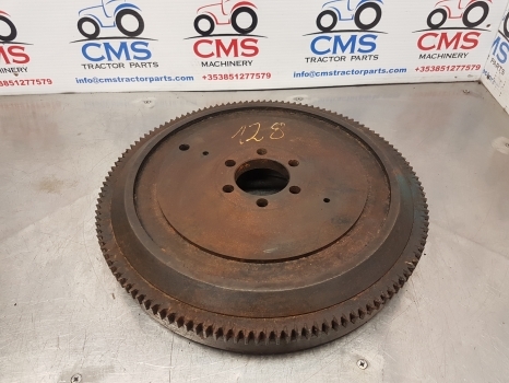 Ford 4100, 4200, 4410, 4500 Engine Flywheel E0nn6375fa, C7nn6375k, 86529653 - Flywheel for Farm tractor: picture 1 Ford 4100, 4200, 4410, 4500 Engine Flywheel E0nn6375fa, C7nn6375k, 86529653 - Flywheel for Farm tractor: picture 1