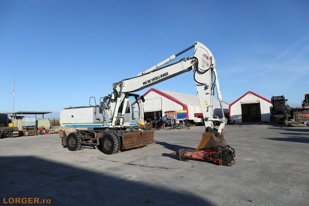 New Holland MH 6.6 + Sandvic Hammer - Wheel excavator: picture 2 New Holland MH 6.6 + Sandvic Hammer - Wheel excavator: picture 2