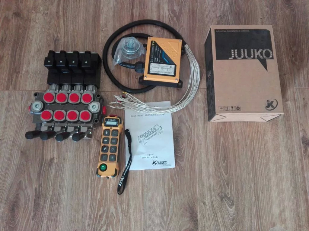 Galtech 4 Functions Valve 60L/min 12/24V + Radio Remote Juuko 800 - Agricultural machinery: picture 1 Galtech 4 Functions Valve 60L/min 12/24V + Radio Remote Juuko 800 - Agricultural machinery: picture 1
