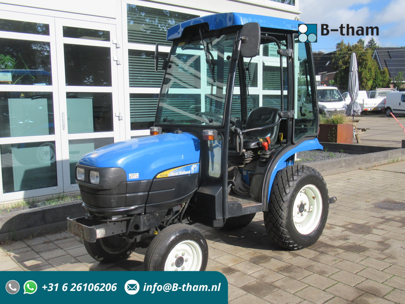 New Holland TC21D 4WD 4x4 Cabine Verwarming - Farm tractor: picture 1 New Holland TC21D 4WD 4x4 Cabine Verwarming - Farm tractor: picture 1