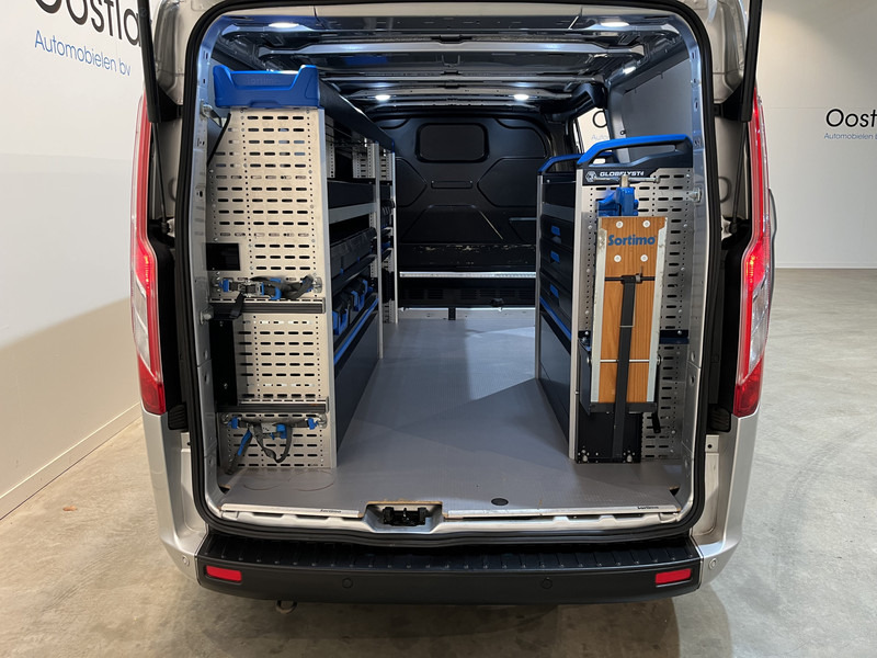 Ford Transit Custom 300 2.0 TDCI L2H1 Trend 130 PK Servicebus / Sortimo Inrichting / Euro 6 / Airco / Cruise Control / Klep / PDC / 3-Zits - Small van: picture 4 Ford Transit Custom 300 2.0 TDCI L2H1 Trend 130 PK Servicebus / Sortimo Inrichting / Euro 6 / Airco / Cruise Control / Klep / PDC / 3-Zits - Small van: picture 4