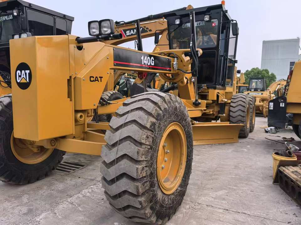 Second Hand Used Construction Machinery Japanese CAT 140G Grader Caterpillar Brand for Sale With Good Condition and Price - Grader: picture 2 Second Hand Used Construction Machinery Japanese CAT 140G Grader Caterpillar Brand for Sale With Good Condition and Price - Grader: picture 2
