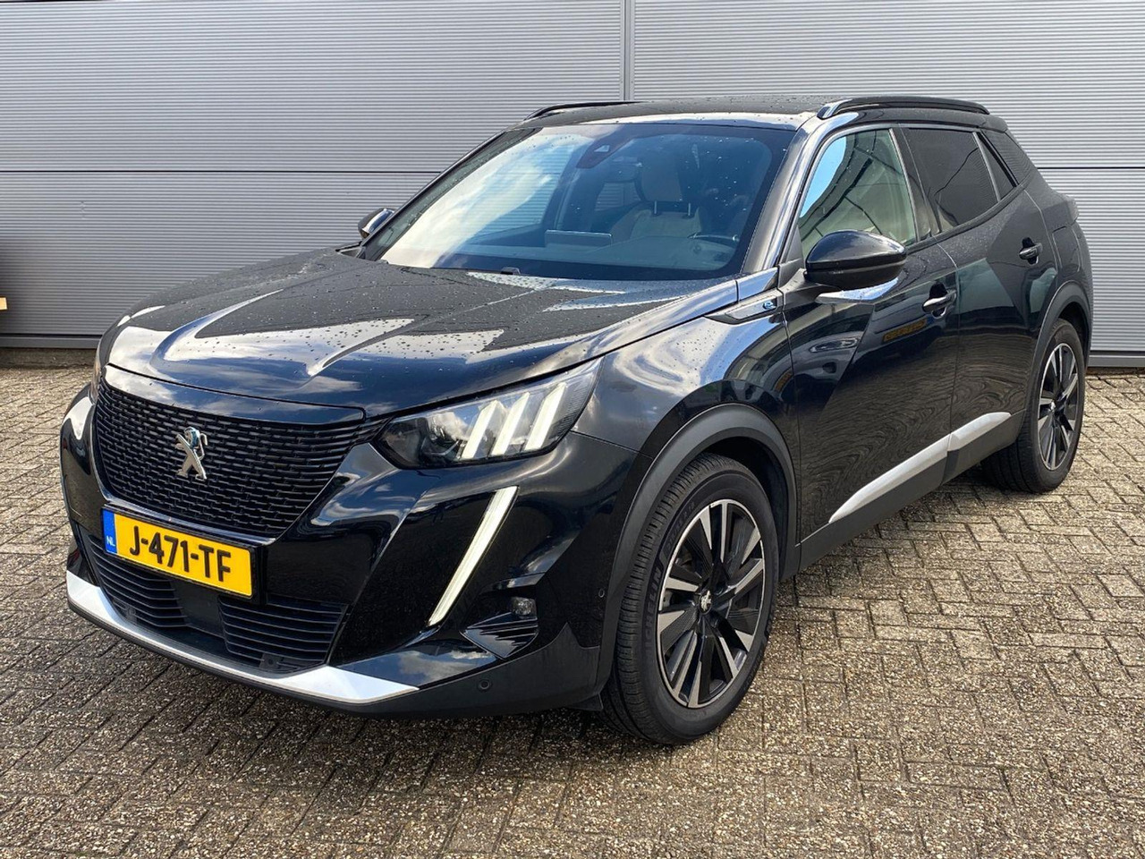 Peugeot e-2008 EV GT Première 1 fase 50 kWh | 2020 | 121.940 km | Automaat | J471TF | NAP: Logisch - SUV: picture 1 Peugeot e-2008 EV GT Première 1 fase 50 kWh | 2020 | 121.940 km | Automaat | J471TF | NAP: Logisch - SUV: picture 1