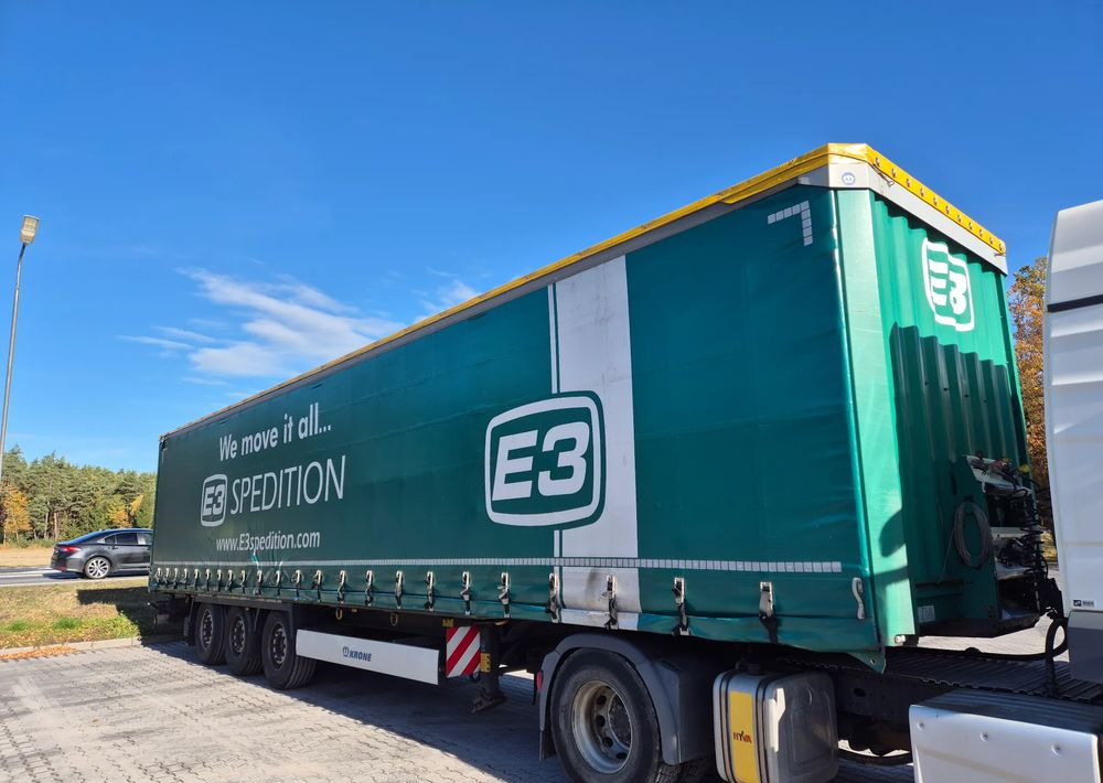 Krone BDE STANDARD PODNOSZONY DACH / z Niemiec PONADGABARYTY POSZERZANA OPONY 80% - Curtainsider semi-trailer: picture 1 Krone BDE STANDARD PODNOSZONY DACH / z Niemiec PONADGABARYTY POSZERZANA OPONY 80% - Curtainsider semi-trailer: picture 1