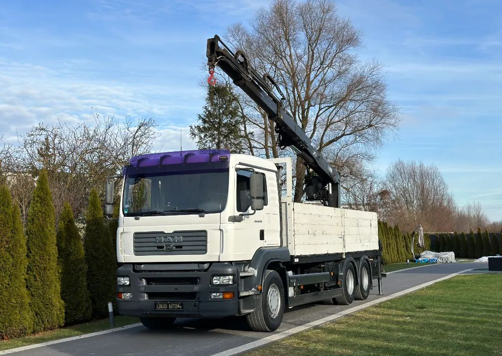 MAN TGA 24.410 6x4 HIAB MANUAL - Crane truck, Dropside/ Flatbed truck: picture 1 MAN TGA 24.410 6x4 HIAB MANUAL - Crane truck, Dropside/ Flatbed truck: picture 1
