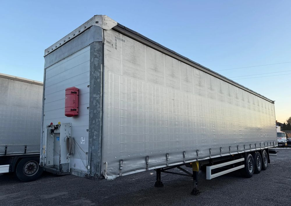 Schmitz Cargobull OSIE SCHMITZ PODNOSZONA OSIE - Curtainsider semi-trailer: picture 1 Schmitz Cargobull OSIE SCHMITZ PODNOSZONA OSIE - Curtainsider semi-trailer: picture 1