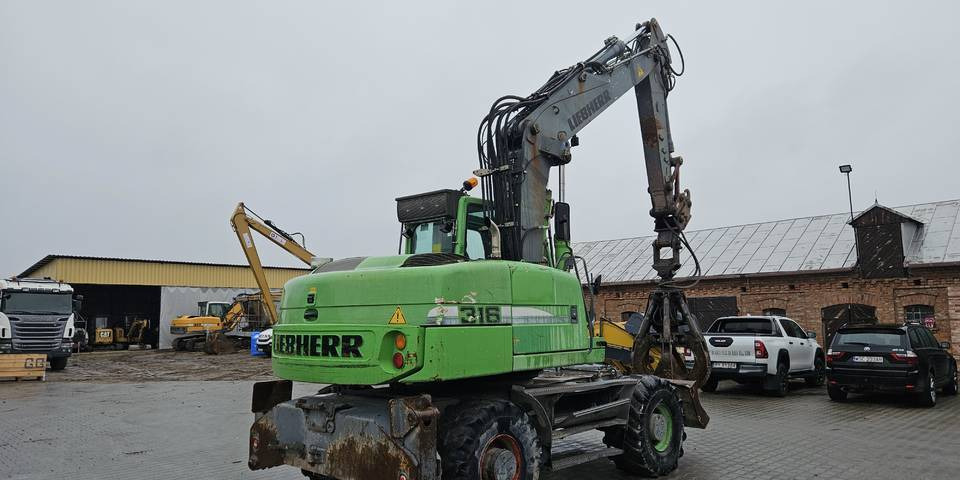 Koparka kołowa Liebherr A 316 Litronic chwytak podpory pług - Wheel excavator: picture 5 Koparka kołowa Liebherr A 316 Litronic chwytak podpory pług - Wheel excavator: picture 5
