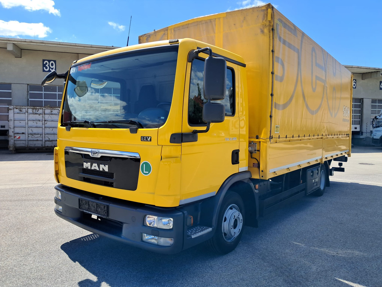 MAN MAN TGL 8.180 Pritsche + LBW | Klima | Tempomat | Schaltgetriebe - Dropside/ Flatbed truck: picture 1 MAN MAN TGL 8.180 Pritsche + LBW | Klima | Tempomat | Schaltgetriebe - Dropside/ Flatbed truck: picture 1