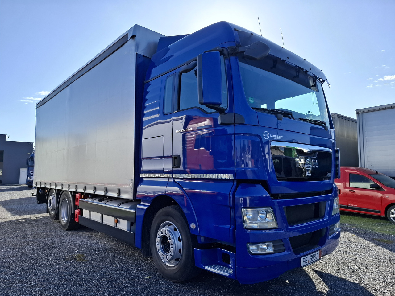 MAN TGX 26.440 E5 - Curtainsider truck: picture 1 MAN TGX 26.440 E5 - Curtainsider truck: picture 1