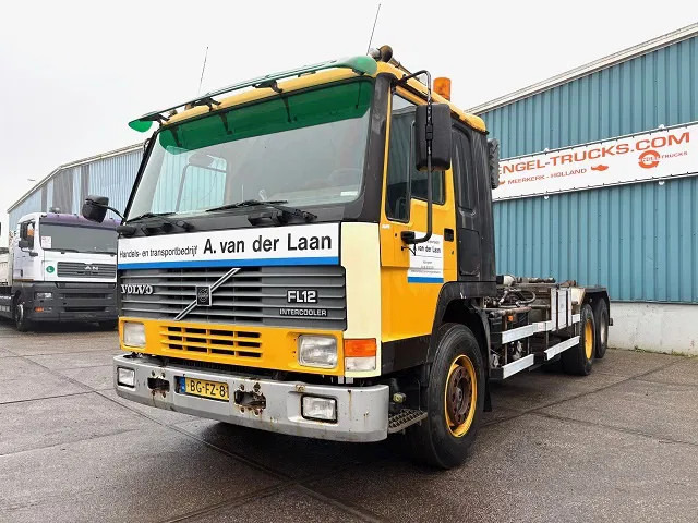 Volvo FL 12.380 6x2 A-RIDE (ORIGINAL DUTCH) HOOK-ARM CONTAINER SYSTEM (FULL STEEL SUSPENSION / REDUCTION AXLE / 10 TIRES / 8.000 KG. F - Hook lift truck: picture 1 Volvo FL 12.380 6x2 A-RIDE (ORIGINAL DUTCH) HOOK-ARM CONTAINER SYSTEM (FULL STEEL SUSPENSION / REDUCTION AXLE / 10 TIRES / 8.000 KG. F - Hook lift truck: picture 1