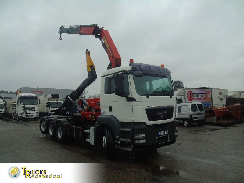 MAN TGS 35.440 + PALFINGER 24500 + 8X4 + EURO 5 + REMOTE - Hook lift truck, Crane truck: picture 1 MAN TGS 35.440 + PALFINGER 24500 + 8X4 + EURO 5 + REMOTE - Hook lift truck, Crane truck: picture 1